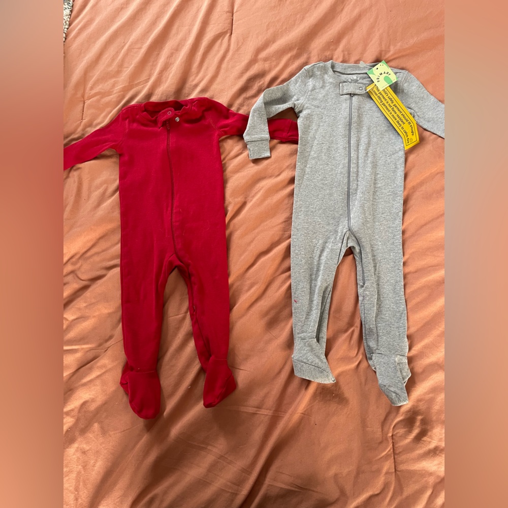 2 pairs Primary footie pjs 6-9
